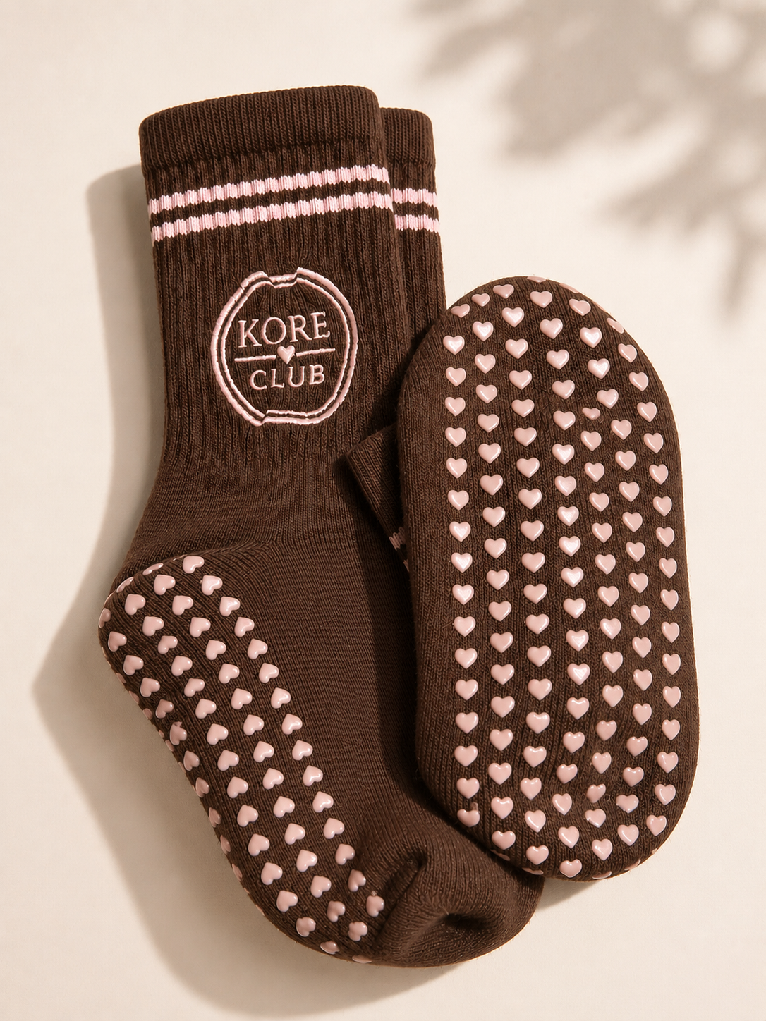 Kore Club Mid-Rise Grip Sock in brown with pink heart grip sole